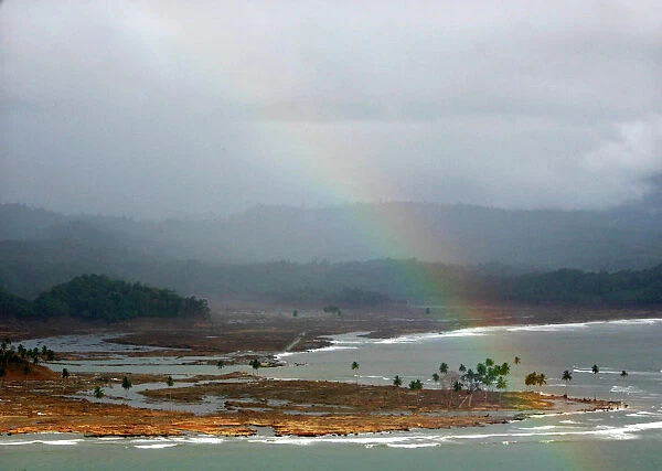 An aerial view shows a rainbow above the shores ofnorthern Sumatra islands, Indonesia