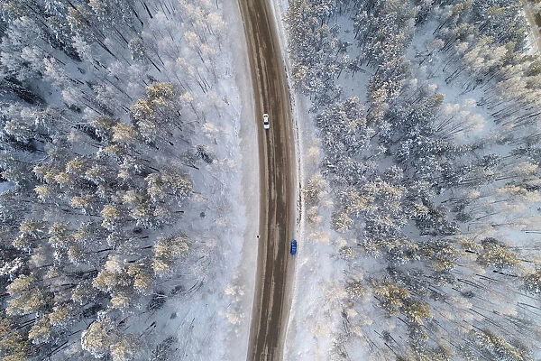 An aerial view shows a road on the banks of the Yenisei River, outside city of Krasnoyarsk