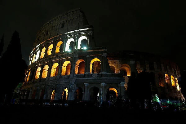 The ancient Colosseum is seen before the lights are switched off for Earth Hour in Rome