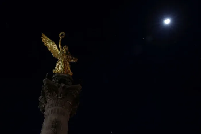 Framed Print : The Angel de la Independencia monument is pictured as lights are turned off during Framed Print : The Angel de la Independencia monument is pictured as lights are turned off during