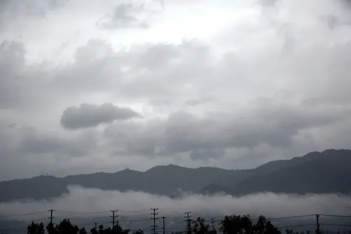 Framed Print : The area of the La Tuna Fire, is preparing for possible mudslides caused by rain on hills