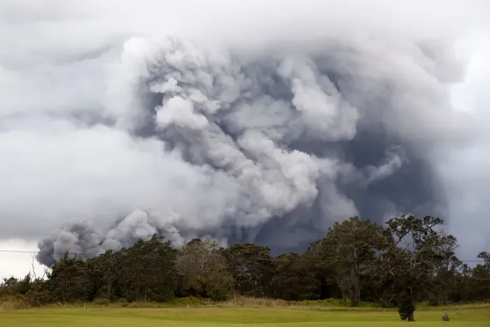 Framed Print : Ash erupts from the Halemaumau crater near the community of Volcano