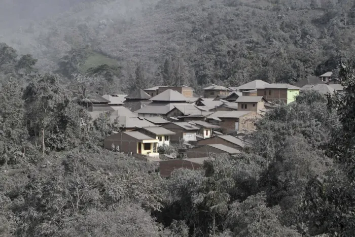 Framed Print : The ash from Sinabung volcano covers trees and houses at Mardingding village Framed Print : The ash from Sinabung volcano covers trees and houses at Mardingding village