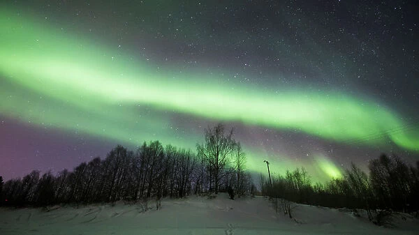 The Aurora Borealis (Northern Lights) is seen over the sky near Rovaniemi in Lapland