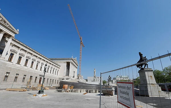 The Austrian Parliament building is seen under construction in Vienna