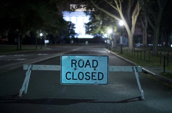 A barricade leading to the Lincoln Memorial prevents access to tourist buses in