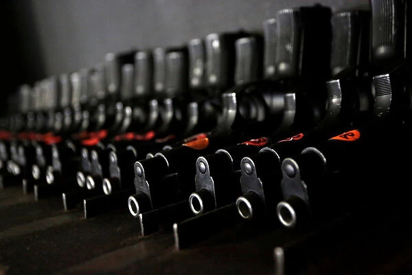 Beretta 9mm pistols are pictured at the police barracks storehouse in Monterrey