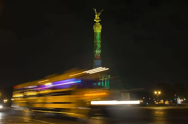 The Berlin Victory Column is illuminated during the Festival of Light show in Berlin