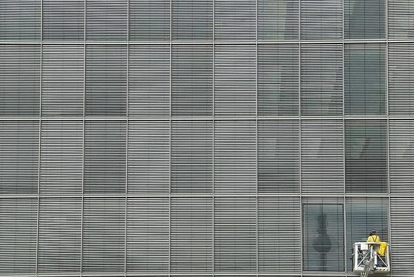 Berlins TV tower is reflected in window of the Marie-Elisabeth-Lueders-Haus parliament