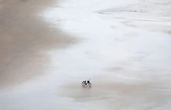 Bicycle is pictured on a beach in Guaruja