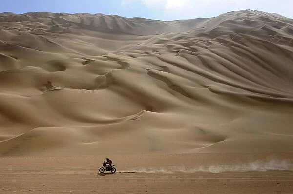 A biker competes during the 11th stage of the fourth South American edition of the