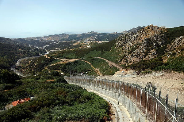 The border fence separating Spains northern enclave Ceuta and Morocco is seen from Ceuta