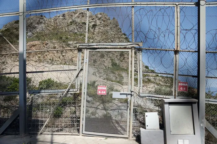 Framed Print : The border fence separating Spains northern enclave Ceuta and Morocco is seen from Ceuta Framed Print : The border fence separating Spains northern enclave Ceuta and Morocco is seen from Ceuta