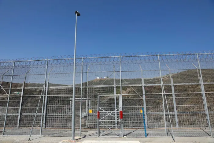 Framed Print : The border fence separating Spains northern enclave Ceuta and Morocco is seen from Ceuta Framed Print : The border fence separating Spains northern enclave Ceuta and Morocco is seen from Ceuta