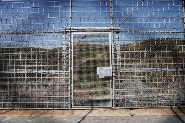 Framed Print : The border fence separating Spains northern enclave Ceuta and Morocco is seen from Ceuta Framed Print : The border fence separating Spains northern enclave Ceuta and Morocco is seen from Ceuta