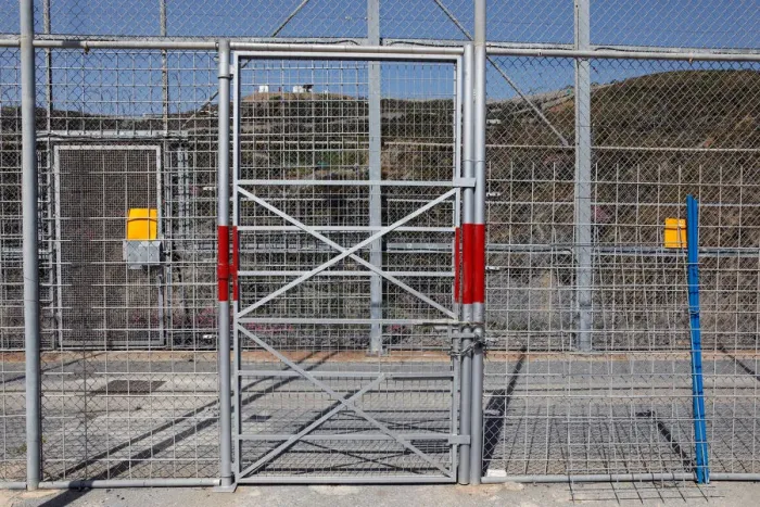 Framed Print : The border fence separating Spains northern enclave Ceuta and Morocco is seen from Ceuta Framed Print : The border fence separating Spains northern enclave Ceuta and Morocco is seen from Ceuta