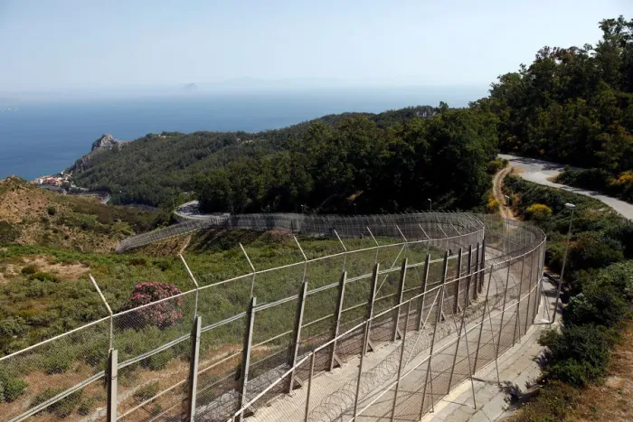 Framed Print : The border fence separating Spains northern enclave Ceuta and Morocco is seen from Ceuta Framed Print : The border fence separating Spains northern enclave Ceuta and Morocco is seen from Ceuta