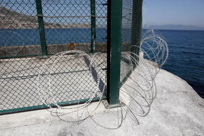 Framed Print : The border fence separating Spains northern enclave Ceuta and Morocco is seen from Ceuta Framed Print : The border fence separating Spains northern enclave Ceuta and Morocco is seen from Ceuta