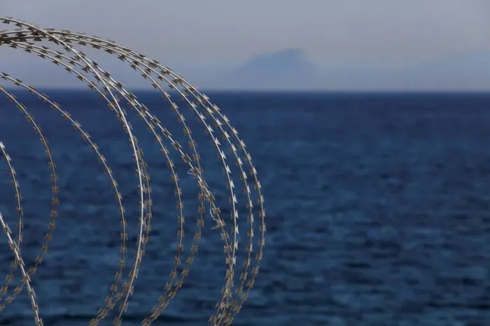Framed Print : The border fence separating Spains northern enclave Ceuta and Morocco is seen from Ceuta