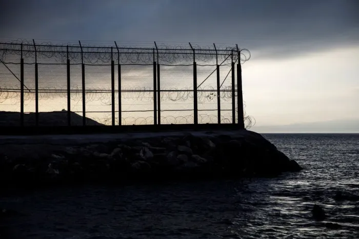 Framed Print : The border fence separating Spains northern enclave Ceuta and Morocco is seen from Ceuta Framed Print : The border fence separating Spains northern enclave Ceuta and Morocco is seen from Ceuta