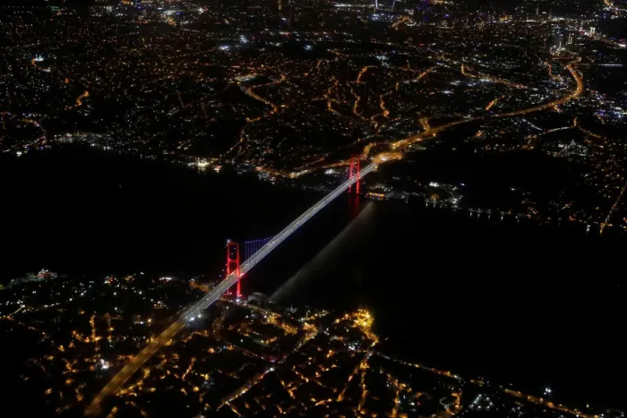 Framed Print : Bosphorus strait and the Fatih Sultan Mehmet Bridge are pictured through the window of a Framed Print : Bosphorus strait and the Fatih Sultan Mehmet Bridge are pictured through the window of a