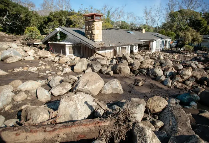 Framed Print : Boulders surround a mud-filled property after a mudslide in Montecito, California Framed Print : Boulders surround a mud-filled property after a mudslide in Montecito, California