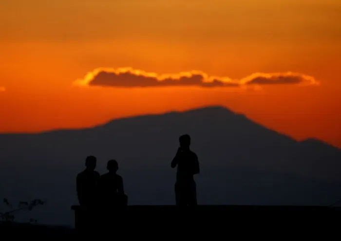 Framed Print : Boys watch atop the roof of their house on the Turkish-Syrian border line in Reyhanli Framed Print : Boys watch atop the roof of their house on the Turkish-Syrian border line in Reyhanli