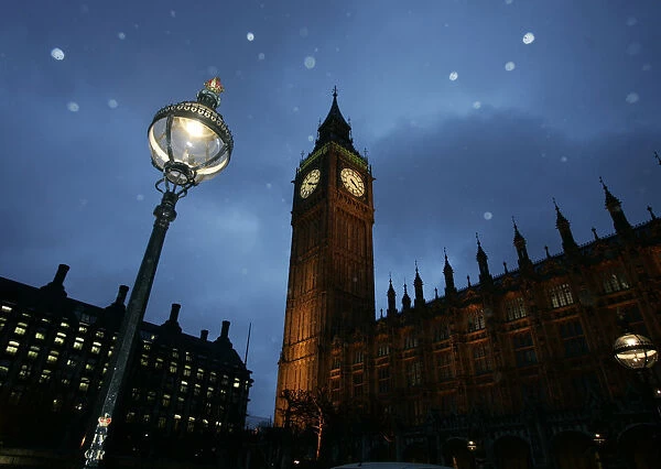 Britains Houses of Parliament are seen during a rain shower in London