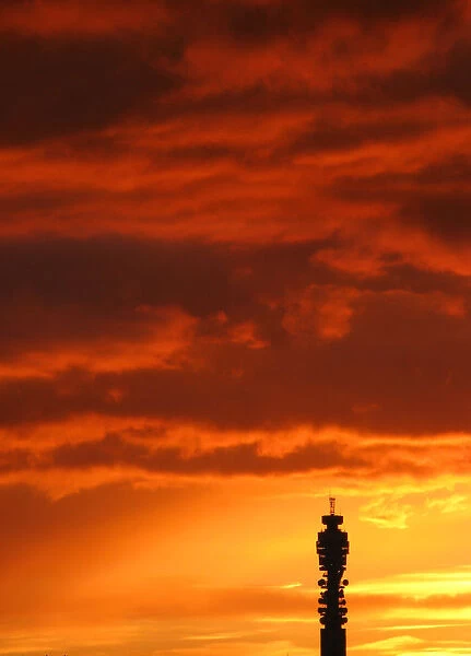 The British Telecom tower is seen silhouetted at dusk in central London
