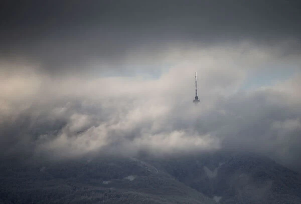 Broadcasting tower Kopitoto is seen through clouds at Vitosha mountain