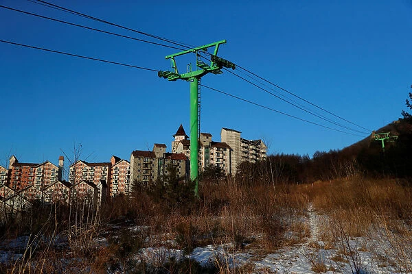 Empty buildings are seen at the abandoned Alps Ski Resort located near the demilitarized