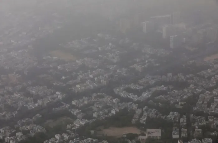 Framed Print : Buildings are seen blanketed by haze and dust on the outskirts of New Delhi Framed Print : Buildings are seen blanketed by haze and dust on the outskirts of New Delhi