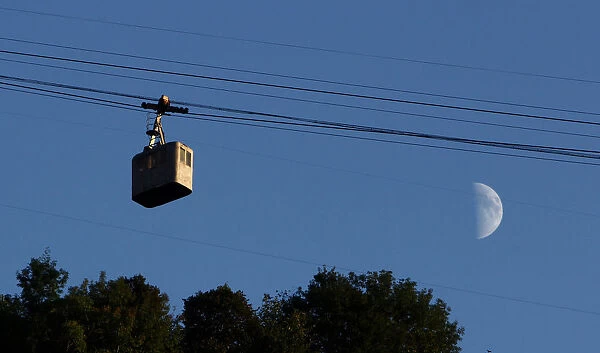 A cable car passes above the town of Chiatura