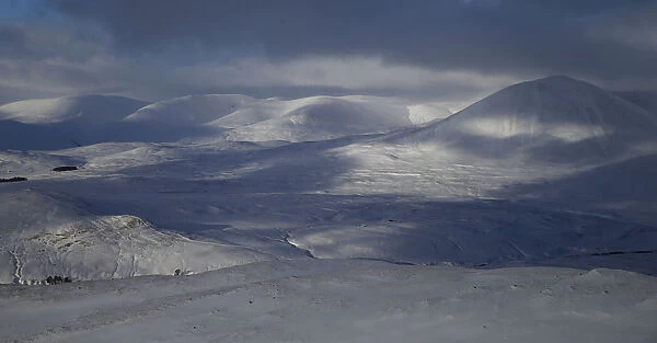 The Cairngorm mountains (Carn Liath on the right ) are seen covered in snow near Blair Atholl