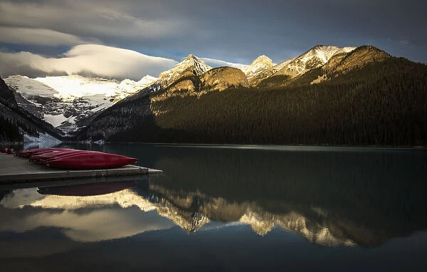 Canoes are seen on a dock on Lake Louise at Banff National Park