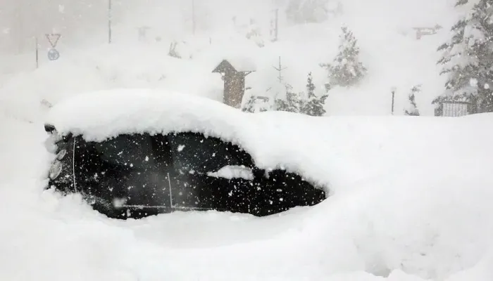 Framed Print : A car is seen during heavy snowfall in Claviere