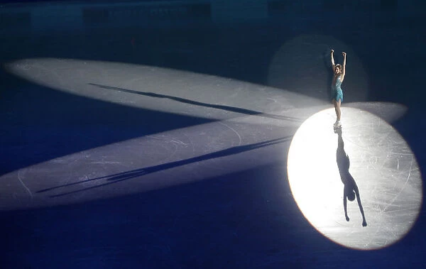 Carolina Kostner of Italy reacts after winning gold medal at the European Figure Skating