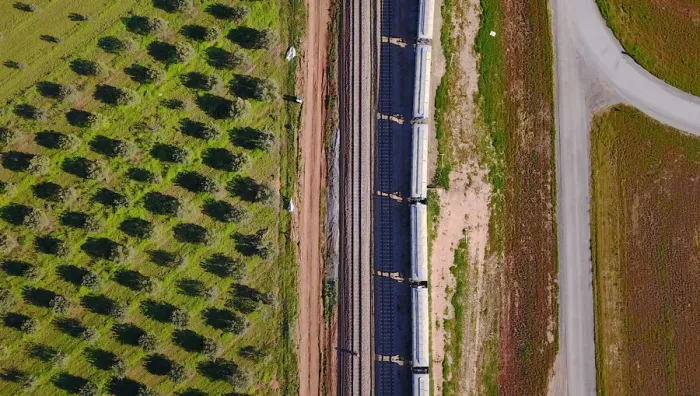 Framed Print : Carriages of a train are loaded with grain at a storage site on the outskirts of Framed Print : Carriages of a train are loaded with grain at a storage site on the outskirts of