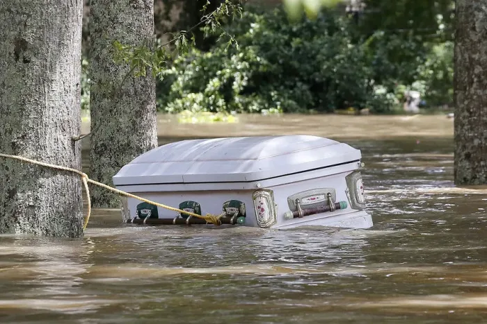 Framed Print : A casket is seen floating in flood waters in Ascension Parish