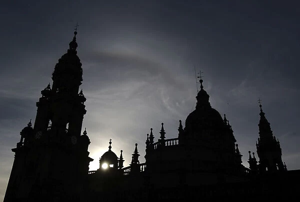 The Cathedral of Santiago de Compostela is seen during sunset in Spain