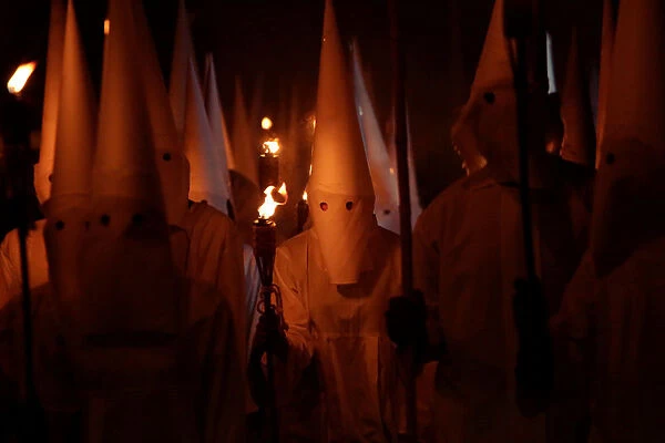 Catholics take part in the Procession of Silence on Good Friday during Holy Week in