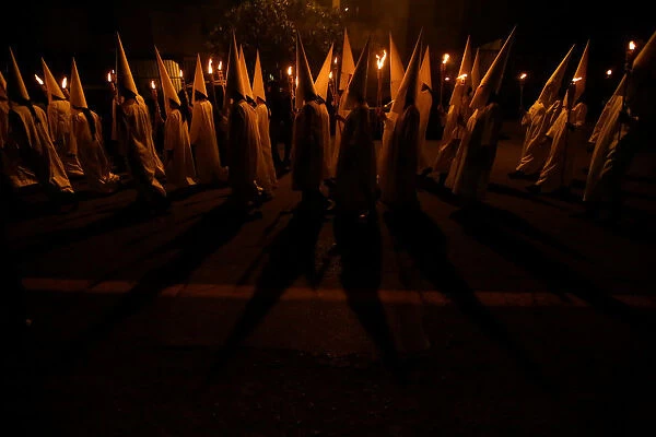 Catholics take part in the Procession of Silence on Good Friday during Holy Week in
