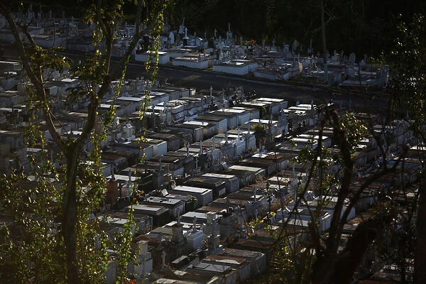 A cemetery is seen in Lares