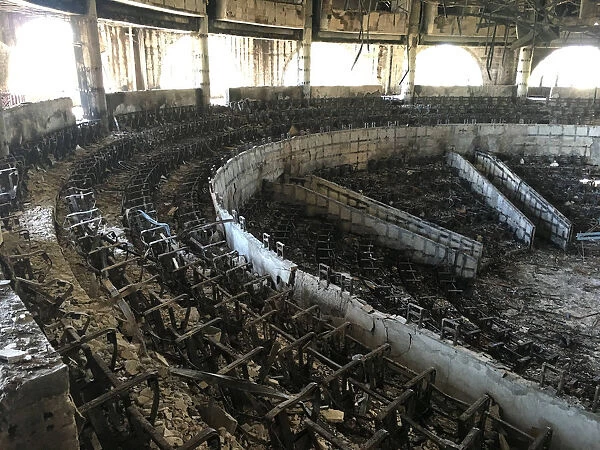 The charred interior of the parliament is seen after it was burned in post-election