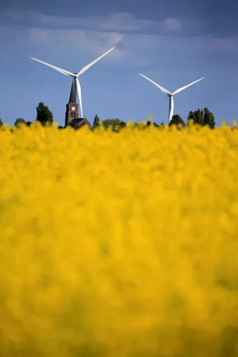 Framed Print : Church and windmills of the village of Saint-Hilaire-Lez-Cambrai are seen behind a Framed Print : Church and windmills of the village of Saint-Hilaire-Lez-Cambrai are seen behind a