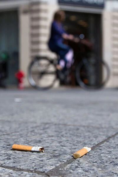 Cigarette butts litter the street in Lyon