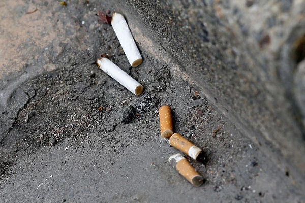 Cigarette butts litter the street in Rochefort