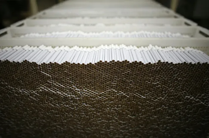 Framed Print : Cigarettes on the production line are pictured at Bulgartabaks Sofia cigarette mill