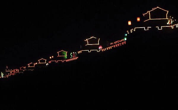 THE CITY WALL AT PINGYAO IS LIT UP FOR CHINESE NEW YEAR