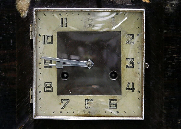 A classic wooden clock is seen at a workshop in Colombo